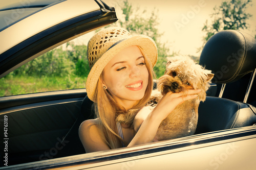 Happy girl with cut dog in ...