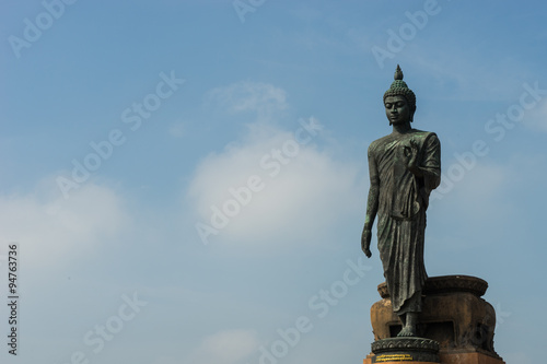 Standing Buddha statue in Thailand