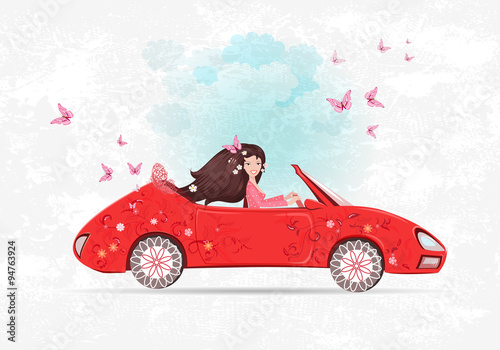 beautiful girl is driving car. the art floral red cabriolet with