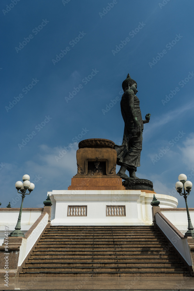 Obraz premium Side Standing Buddha statue in Thailand
