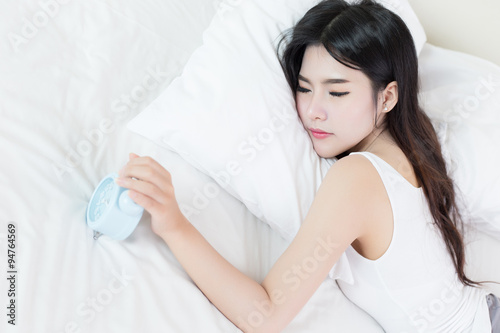 young beautiful woman sleeping on bed