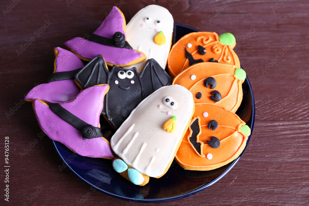 Halloween cookies on black plate
