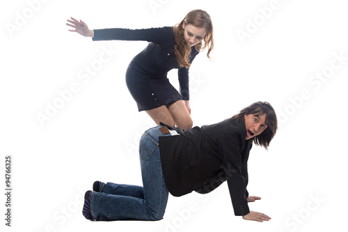 Obraz na plátně Woman beating man in black jacket
