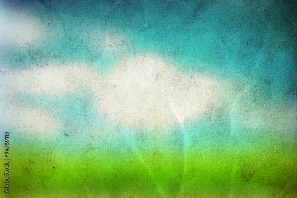 Conceptual green grass and sky old paper Conceptual green grass and sky old paper