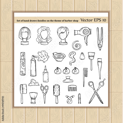 Set of hand drawn doodles on the theme of barber shop
