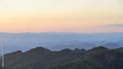 Sunset sky and misty layer mountain in sri nan national park thailand