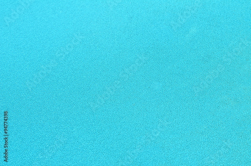 Blue cloth background.