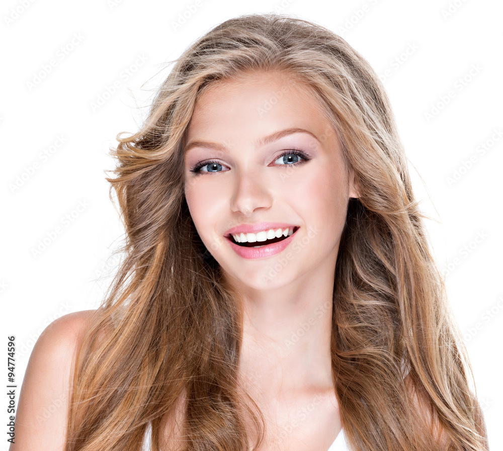 Beautiful happy woman with long curly hair. Beautiful happy woman with long curly hair.