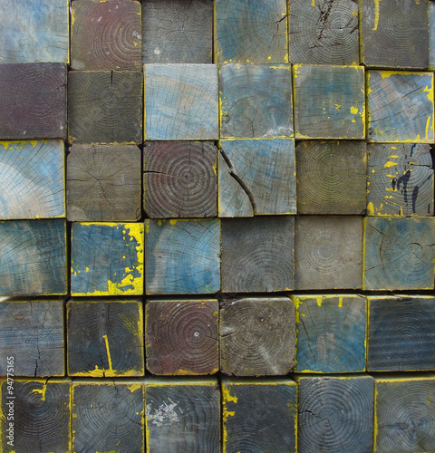 stacked tiled wooden blocks in multiple color background