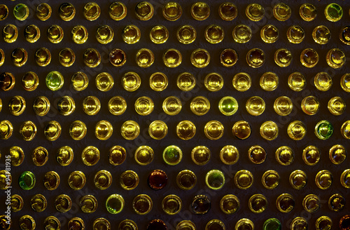 Illuminated bottle bottoms, background photo