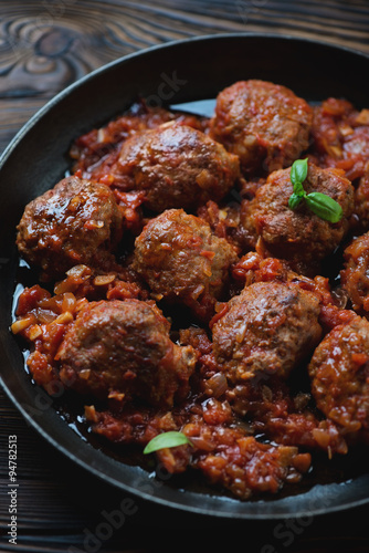 Close-up of meatballs with tomato sauce, selective focus