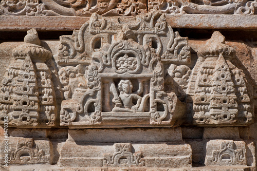 Sculptural relief in stone of Hindu goddess with a musical instrument Sitar