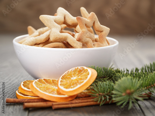 classic star cookies in white bowl with christmas decorations