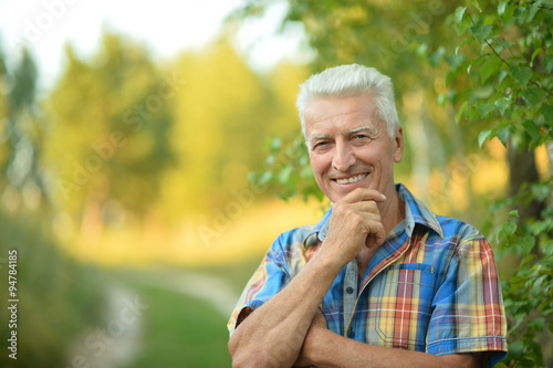 senior man in summer park