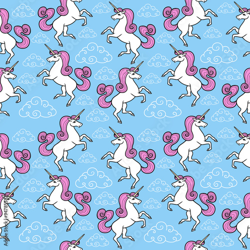 Cartoon seamless pattern. Unicorn with rainbow and clouds. For designed print.