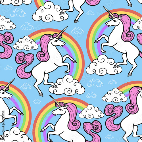 Cartoon seamless pattern. Unicorn with rainbow and clouds. For designed print.