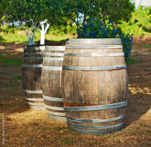 Three wine barrels in the garden.