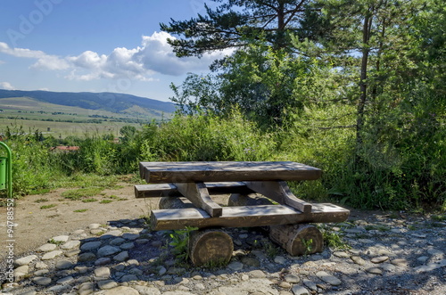 Wooden table and bench by eco trail to Prevails Mali town, Bulgaria photo