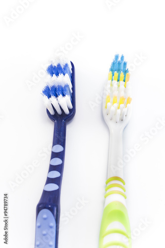 Two toothbrushes isolated on white