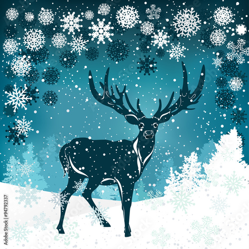 Silhouette of deer with big antler on winter background
