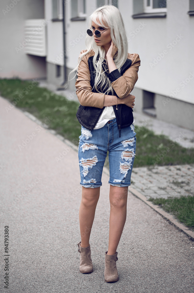 Beautiful girl in posing outside