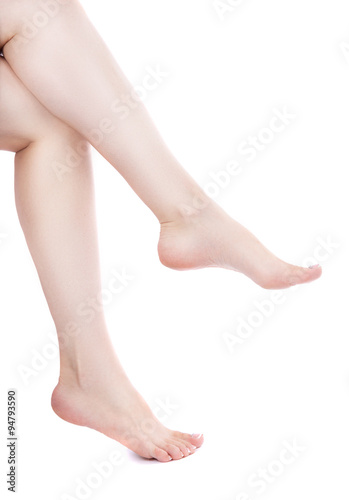 shapely female legs. Isolation on a white background.