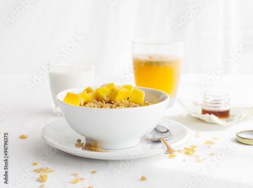 Healthy breakfast. Corn flakes, muesli, granola, with fresh orange juice