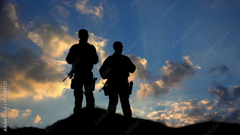 Two Soldiers Silhouette Standing Against Clouds HD Two Soldiers Silhouette Standing Against Clouds HD