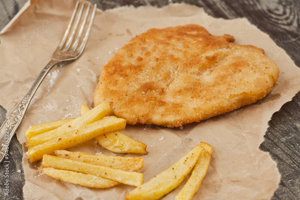 cutlet topped with french fries cutlet topped with french fries
