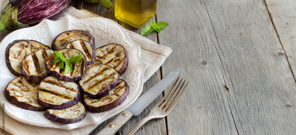 Grilled eggplants seasoned with olive oil Grilled eggplants seasoned with olive oil