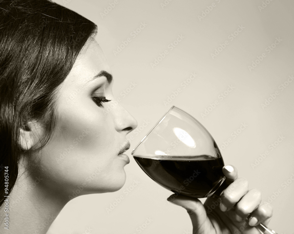 Portrait of beautiful woman drinking wine, black and white retro stylization Portrait of beautiful woman drinking wine, black and white retro stylization