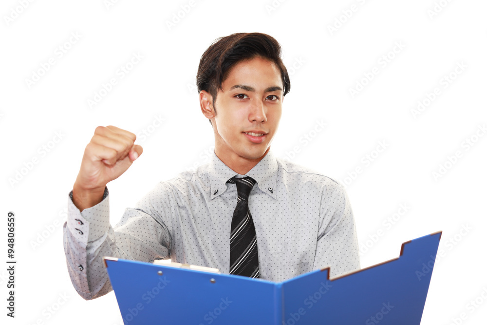 ガッツポーズのビジネスマン