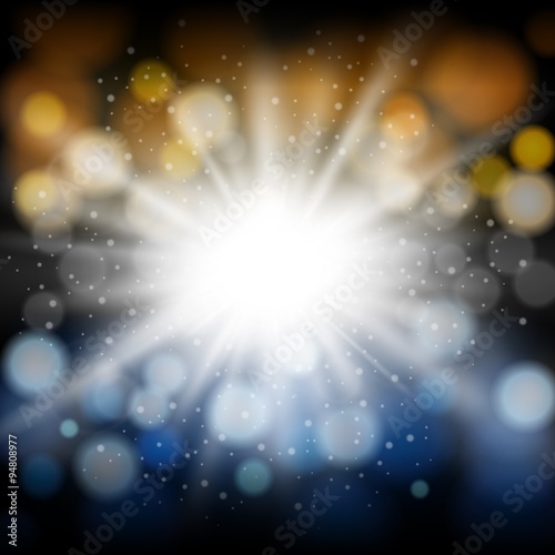 White light shining with blue and orange bokeh