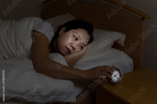 Mature woman restless at night time