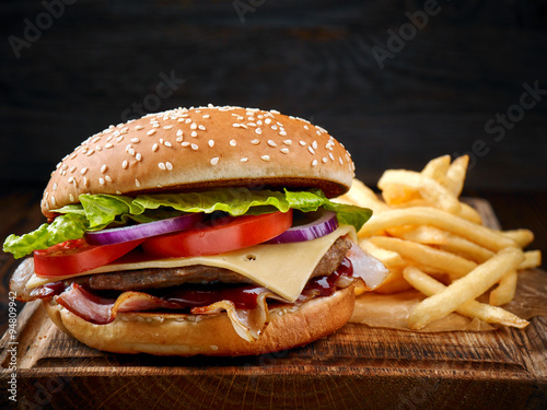 fresh tasty burger and french fries photo