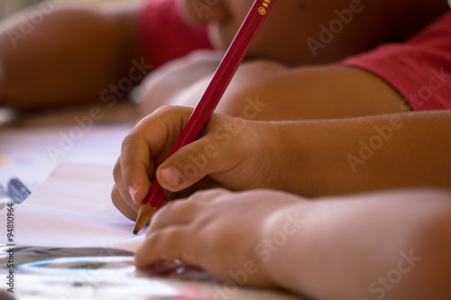 Kids drawing to paper