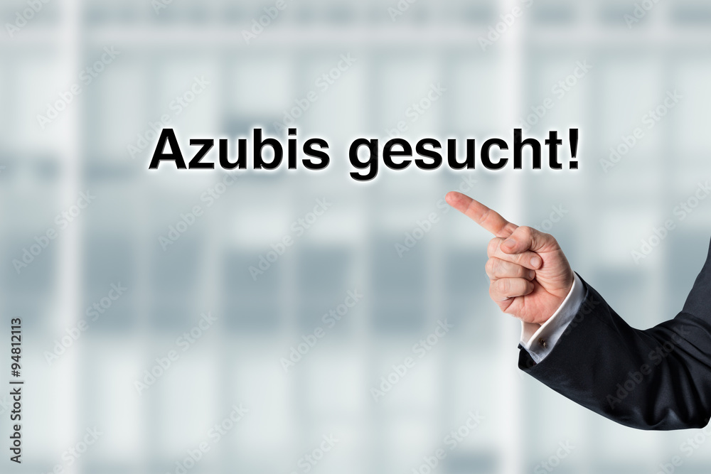 Business man pointing at the words We are looking for employees Business man pointing at the words We are looking for employees
