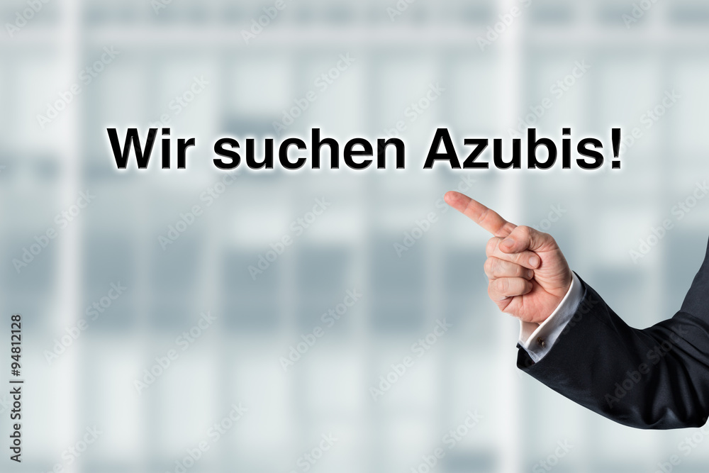 Business man pointing at the words We are looking for employees Business man pointing at the words We are looking for employees