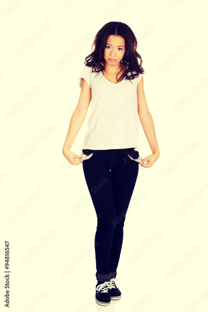 Fototapeta premium Woman showing empty pockets.