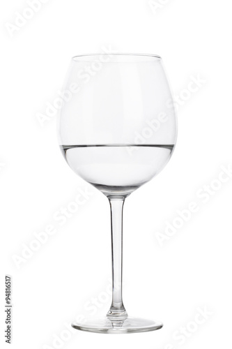 Glass with clean water on white