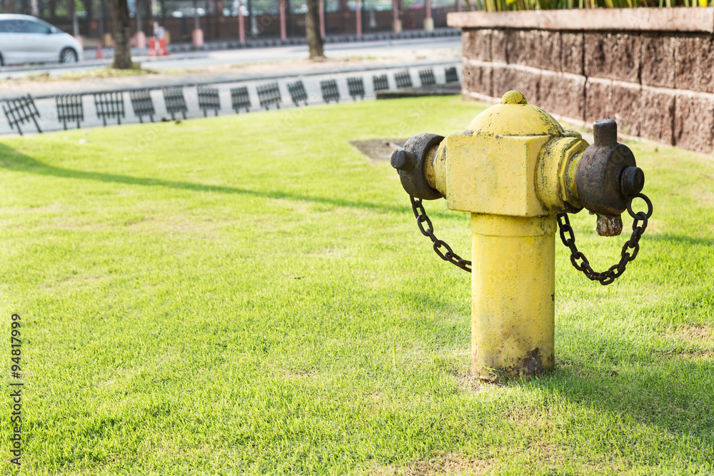 Yellow fire hydrant at strategic residential ready for emergency Yellow fire hydrant at strategic residential ready for emergency