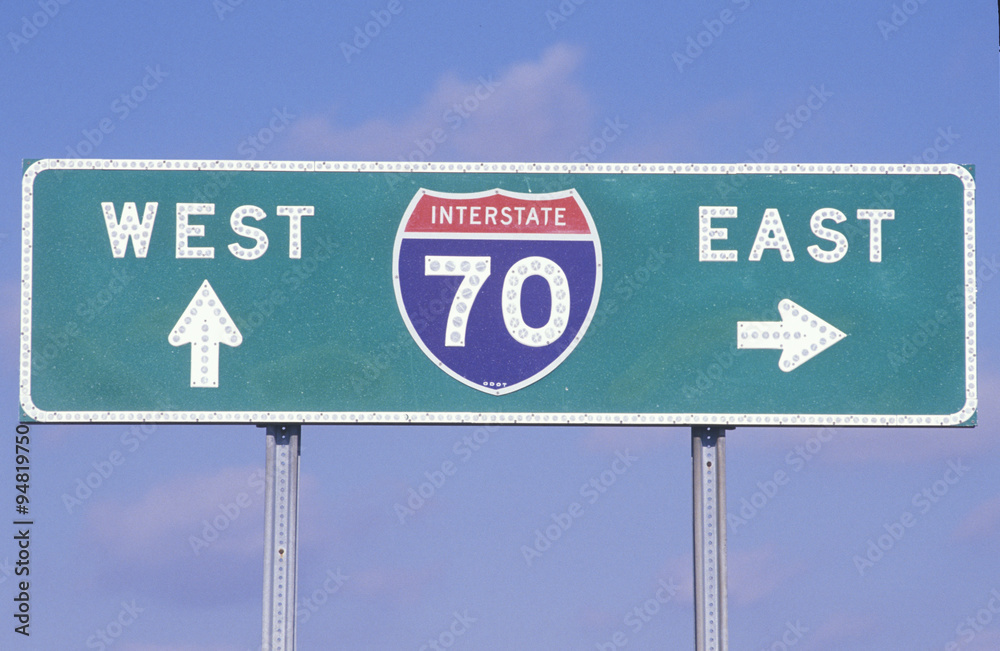 A sign for interstate 70 west and east A sign for interstate 70 west and east