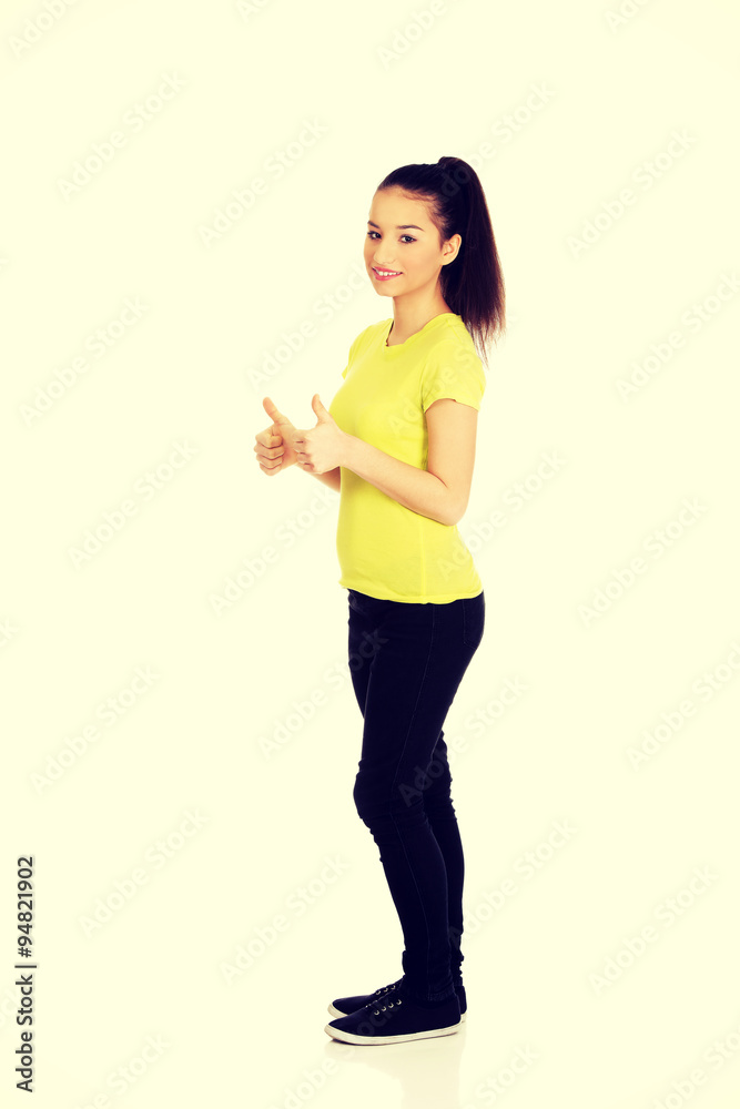 Happy woman with thumbs up. Happy woman with thumbs up.