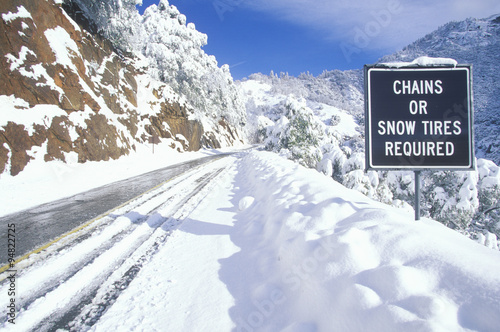 A sign that reads ÒChains or Snow Tires RequiredÓ