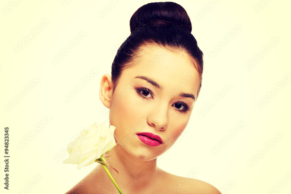 Naklejka premium Beautiful woman with white rose.