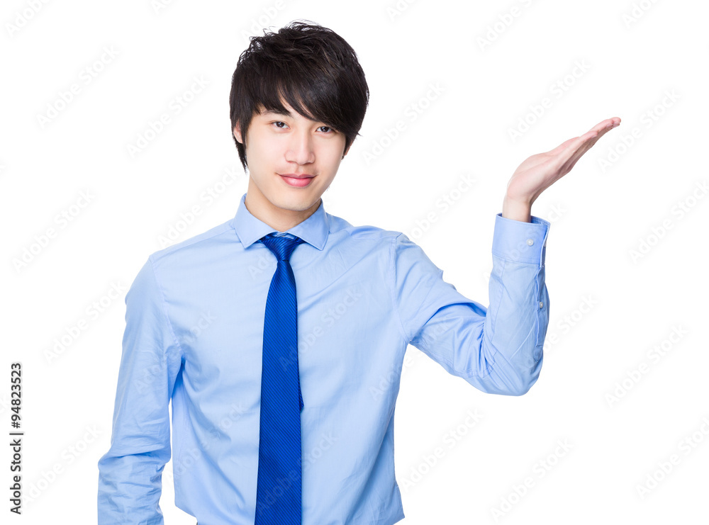 Asian Young Businessman with open hand palm Asian Young Businessman with open hand palm