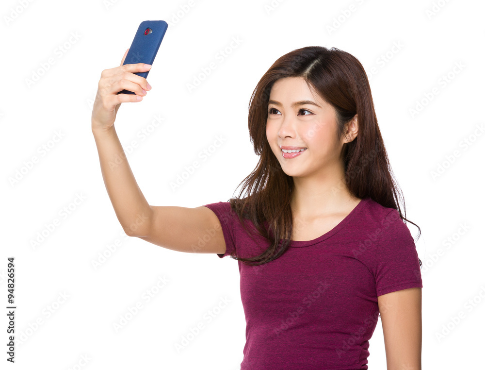 Asian Young Woman take selfie by cellphone Asian Young Woman take selfie by cellphone
