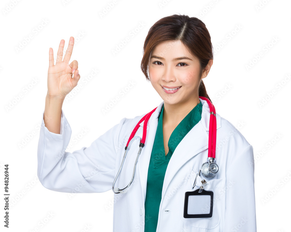 Asian Young Doctor with ok sign gesture Asian Young Doctor with ok sign gesture