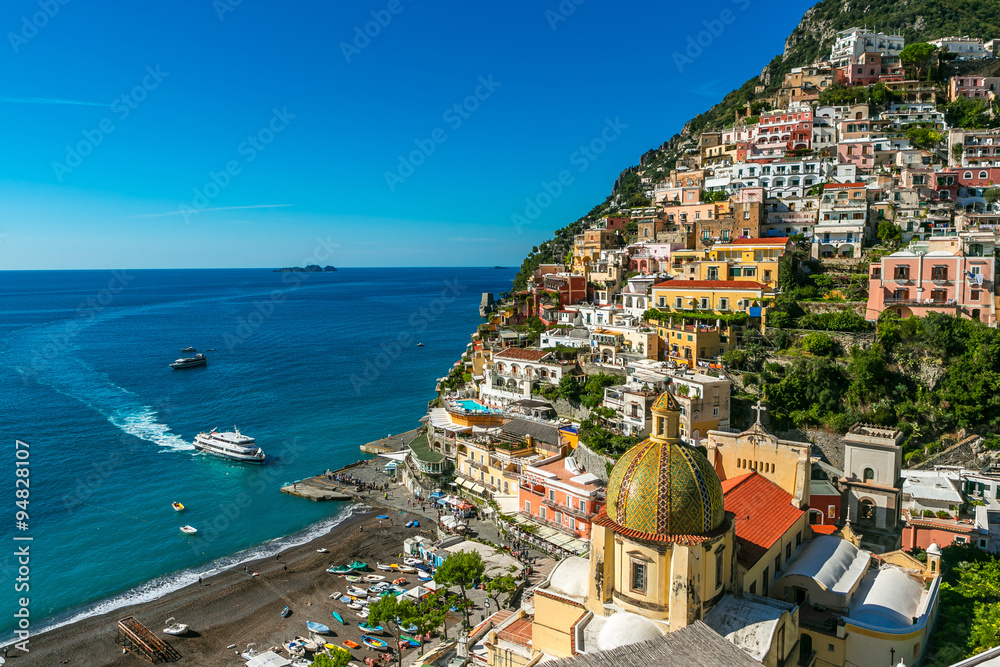 ship is approaching to Positano Italy Port Waterfront.