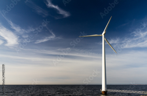 Large modern wind turbine at the Markermeer lake in the Netherlands